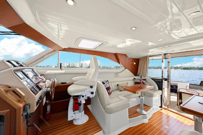 Slide: The Image of Luxurious 2007 Oyster LD43 yacht interior with plush seating and modern helm. - 36