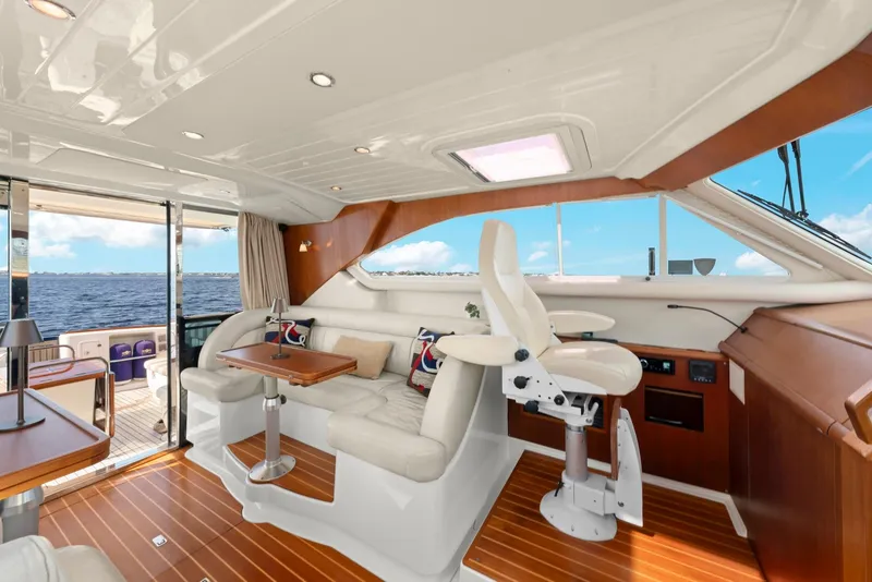 Slide: The Image of Luxurious 2007 Oyster LD43 yacht interior with elegant seating and ocean view. - 37
