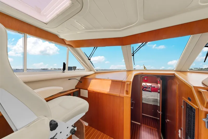 Slide: The Image of Interior of 2007 Oyster LD43 yacht with wooden finish and panoramic windows. - 38