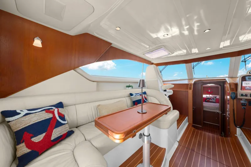 Slide: The Image of Luxurious interior of 2007 Oyster LD43 yacht with elegant seating and nautical decor. - 40