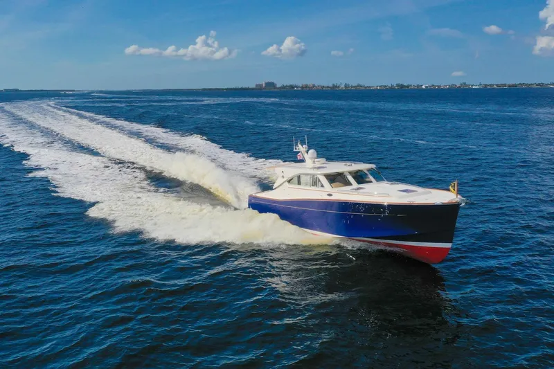 Slide: The Image of 2007 Oyster LD43 yacht cruising on open blue water under clear skies. - 6