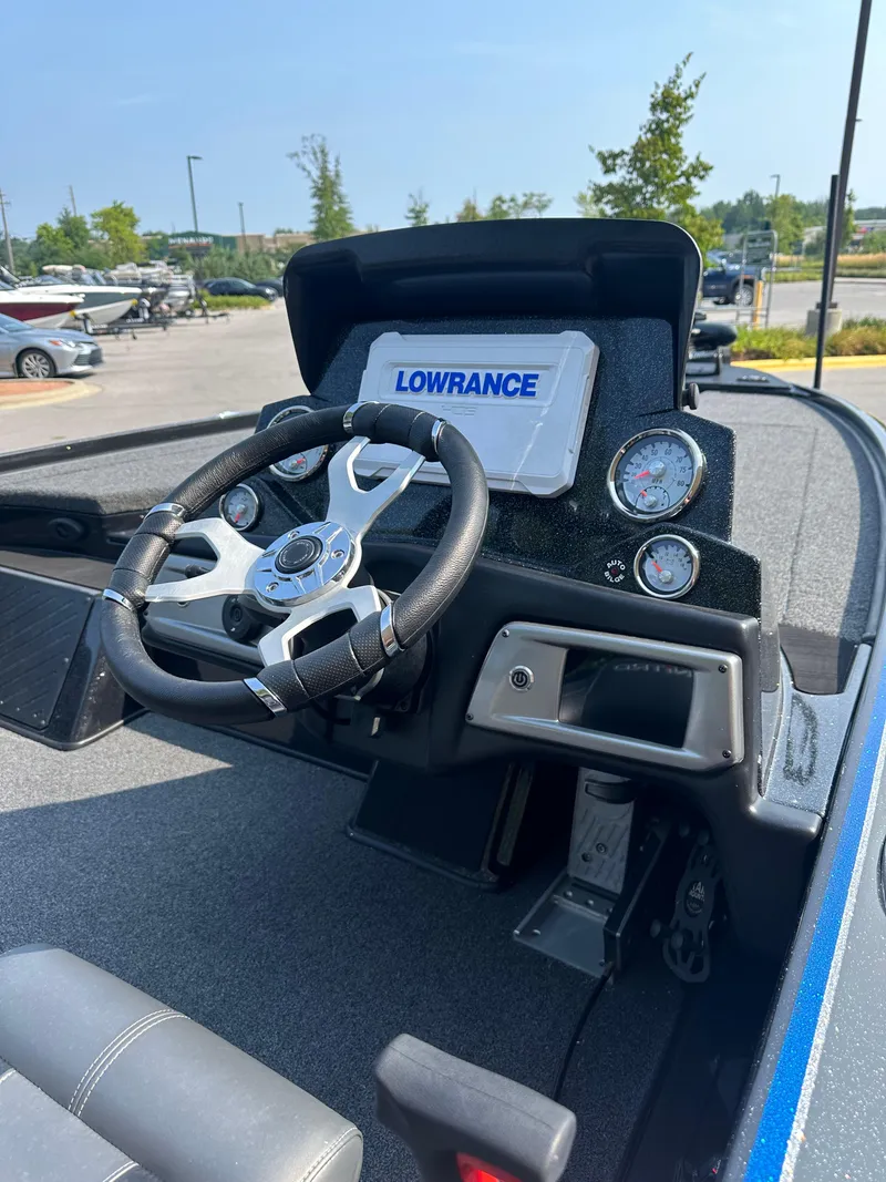 Slide: The Image of 2024 Nitro Z20 Pro boat dashboard with Lowrance electronics and steering wheel. - 6