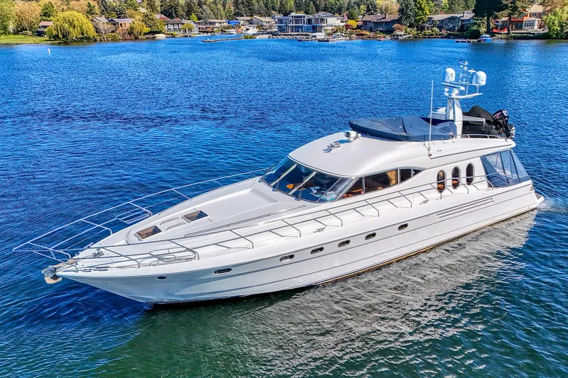 The Image of 2001 Viking Sport Cruisers Motoryacht cruising on a serene lake. - 1