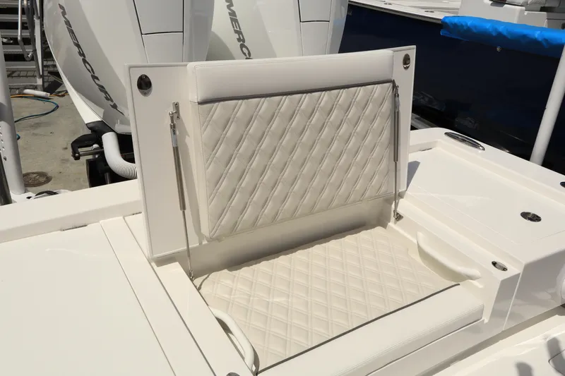 Slide: The Image of 2024 Valhalla Boatworks V-28 cushioned seating with diamond stitching. - 12