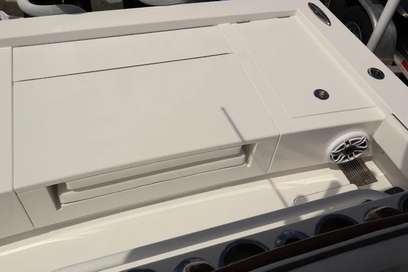 Slide: The Image of 2024 Valhalla Boatworks V-28 deck with storage compartments and speaker. - 13
