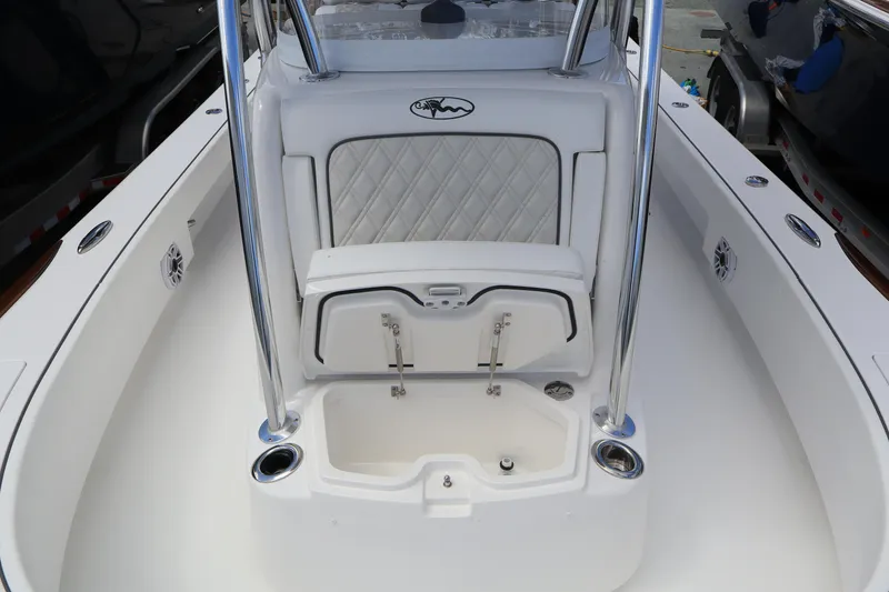 Slide: The Image of 2024 Valhalla Boatworks V-28 center console seating with storage compartment. - 18