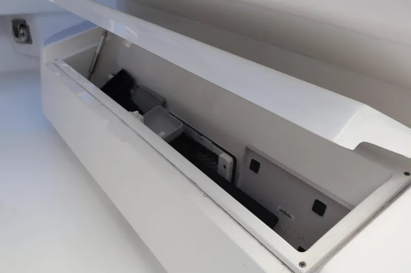 Slide: The Image of 2024 Valhalla Boatworks V-28 storage compartment with open lid. - 20