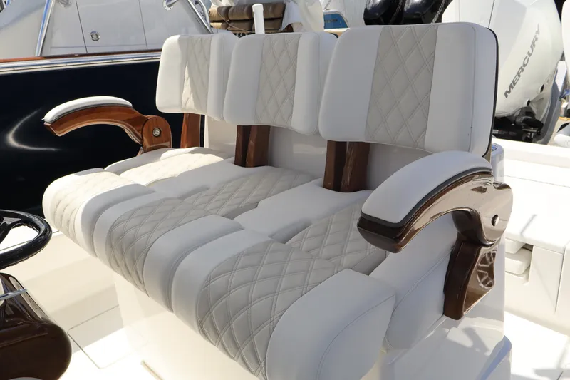 Slide: The Image of Luxurious seating on the 2024 Valhalla Boatworks V-28 with diamond-stitched upholstery. - 3