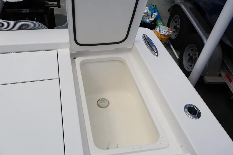 Slide: The Image of 2024 Valhalla Boatworks V-28 open storage compartment on deck. - 35