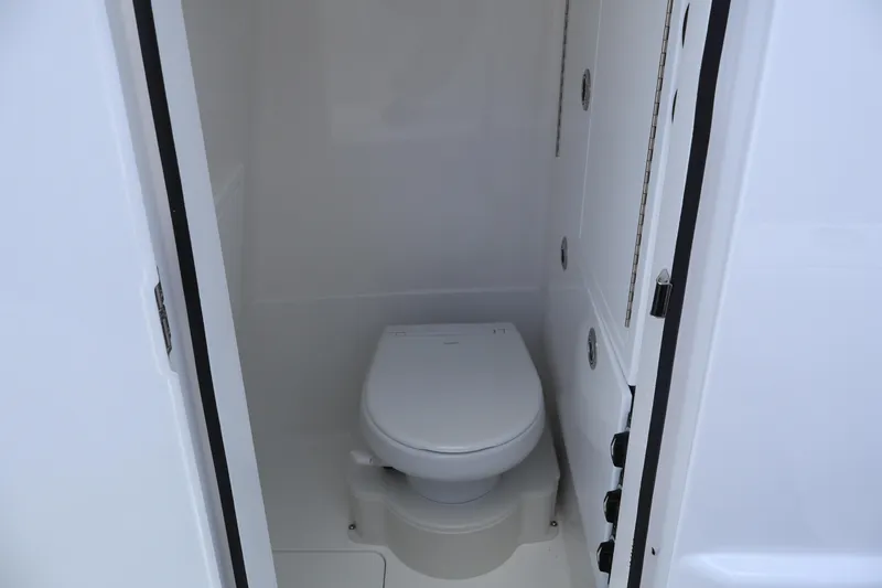 Slide: The Image of 2024 Valhalla Boatworks V-28 interior bathroom with modern toilet. - 36