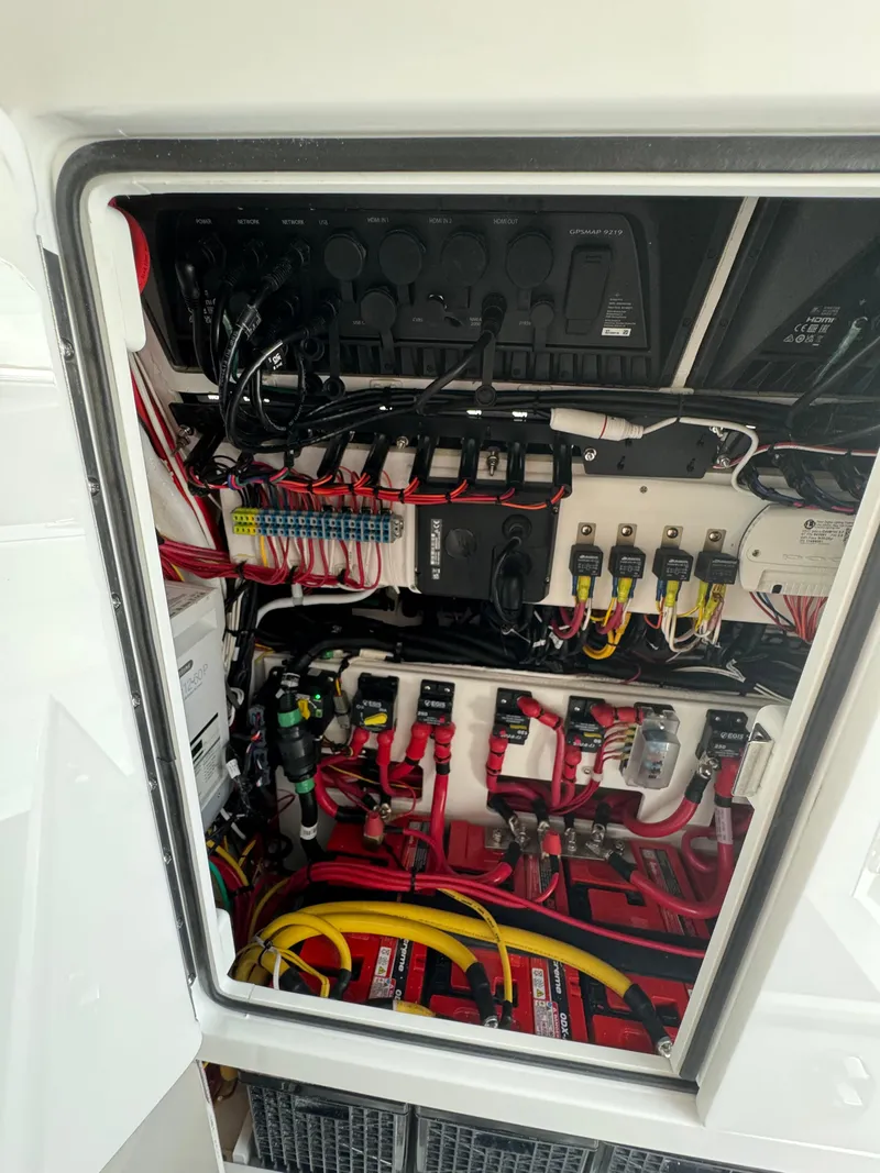 Slide: The Image of Electrical panel of 2024 Valhalla Boatworks V-28 boat with wiring and circuit breakers. - 39