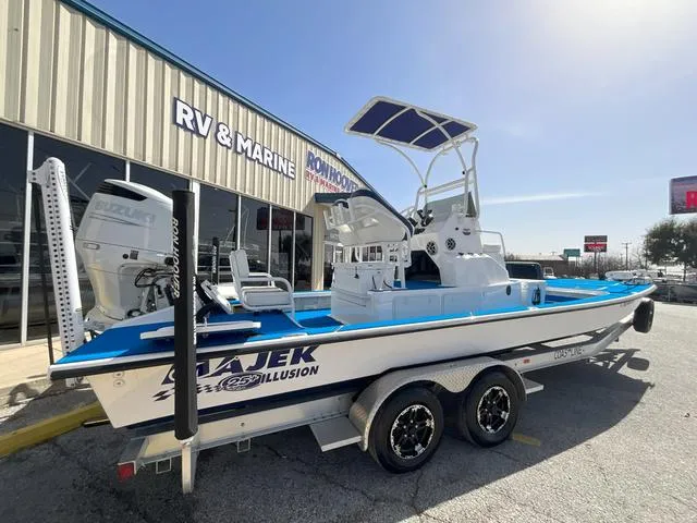 Slide: The Image of 2024 Majek 25 ILLUSION boat on trailer outside RV & Marine store. - 4