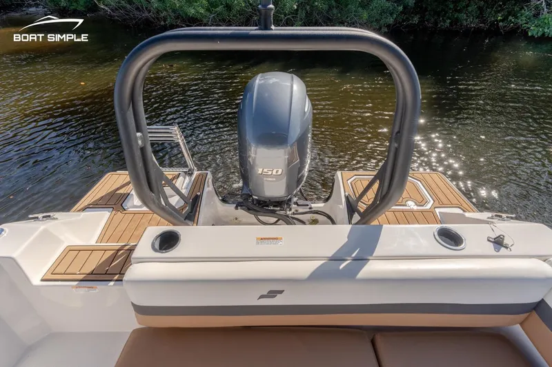 Slide: The Image of 2022 Starcraft SVX 191 OB boat with 150 HP outboard motor on water. - 11