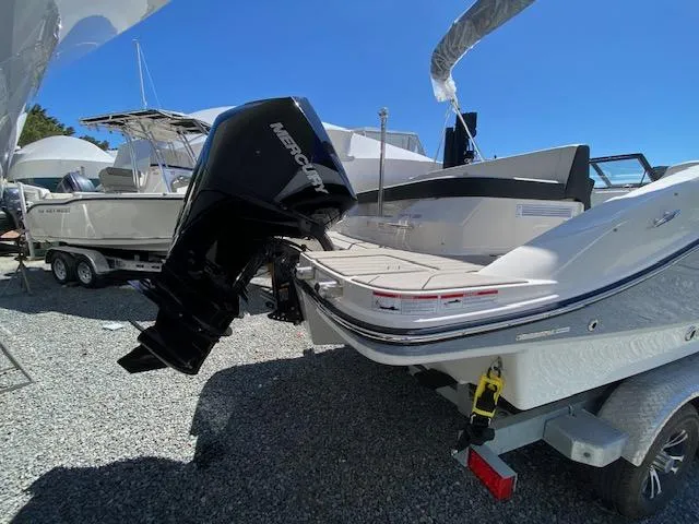 Slide: The Image of 2024 Sea Ray SPX 210 OB boat with Mercury outboard motor. - 2