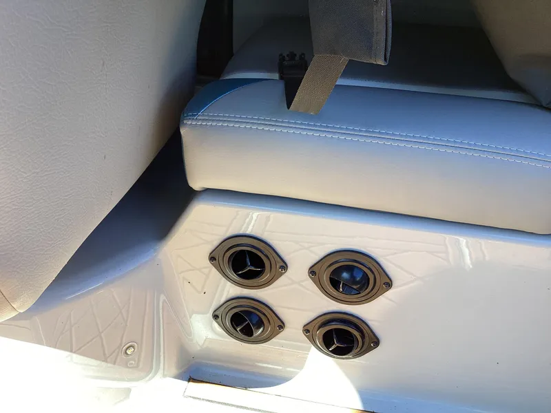 Slide: The Image of 2020 Tigé 21ZX boat interior with air vents and cushioned seating. - 5