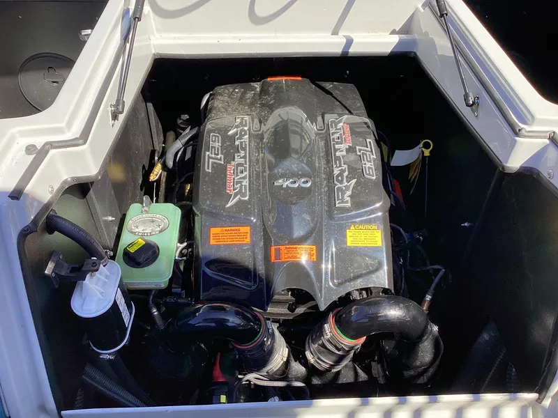 Slide: The Image of 2020 Tigé 21ZX boat engine compartment with Raptor 400 engine. - 6