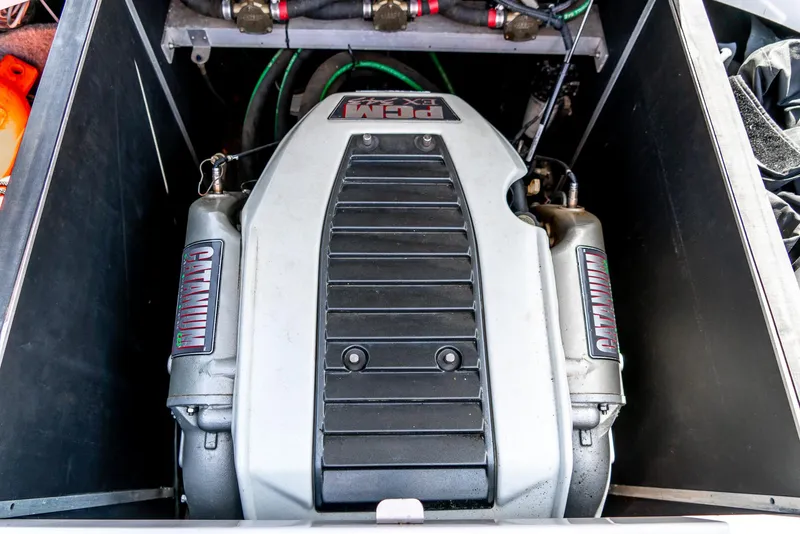 Slide: The Image of 2013 Nautique 210 SUPER AIR engine compartment with PCM engine. - 26