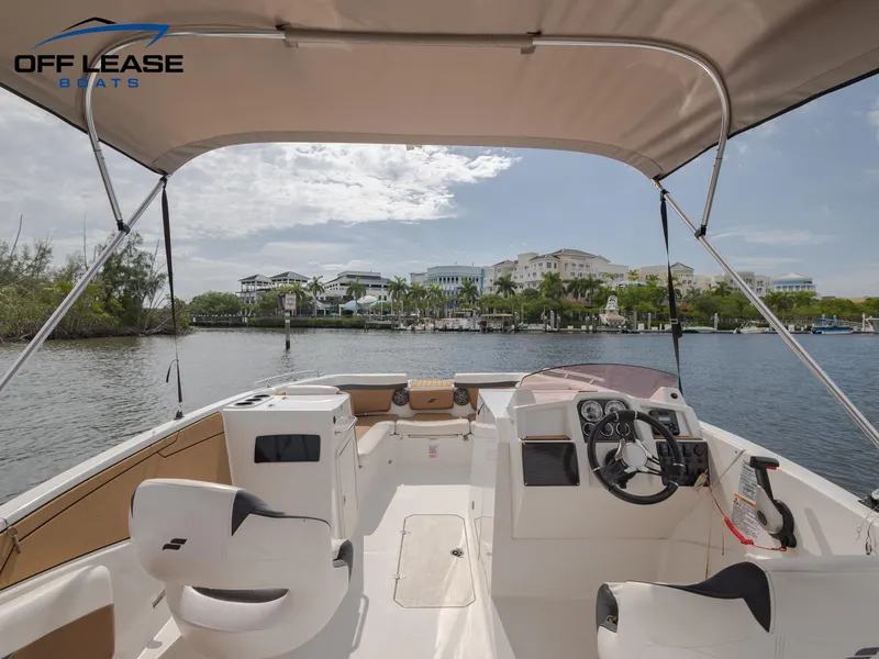 Slide: The Image of 2021 Starcraft SVX 231 OB boat interior with waterfront view. - 8