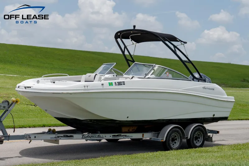 Slide: The Image of 2020 Hurricane 217 SD boat on trailer with bimini top, Off Lease Boats. - 0