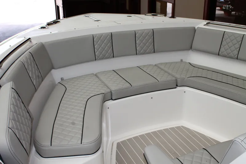 Slide: The Image of 2025 Pursuit S 358 Sport boat with luxurious gray seating. - 20