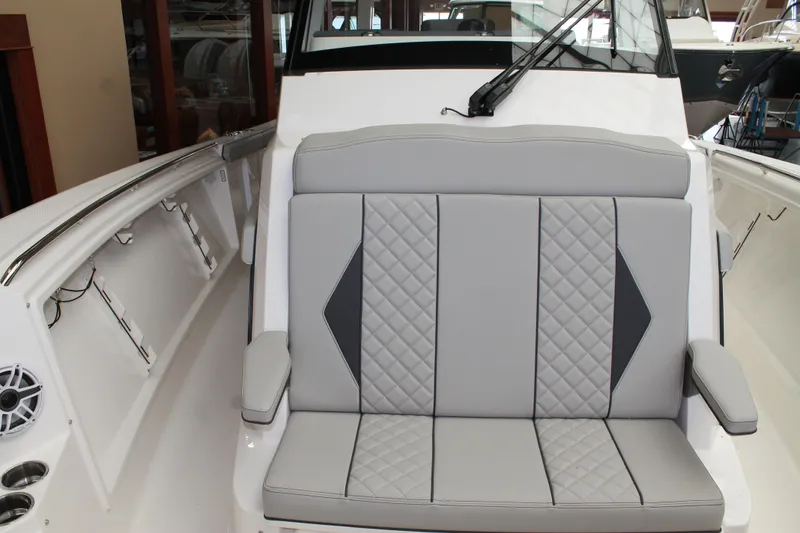 Slide: The Image of 2025 Pursuit S 358 Sport boat with luxurious gray seating. - 23