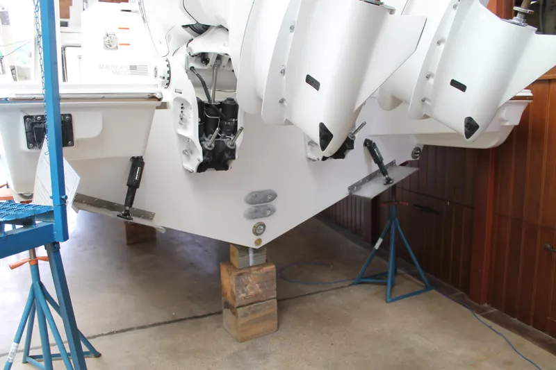 Slide: The Image of 2025 Pursuit S 358 Sport boat on stands in a workshop. - 3