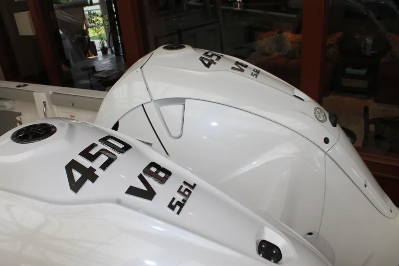 Slide: The Image of 2025 Pursuit S 358 Sport boat with twin 450 V8 5.6L engines. - 5