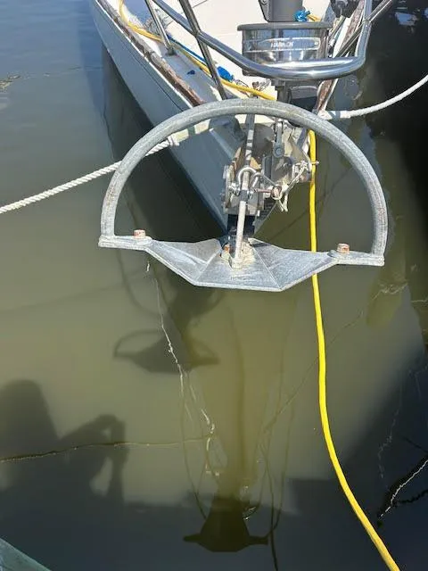 Slide: The Image of Anchor of a 1988 Sabre 38 sailboat in water. - 37