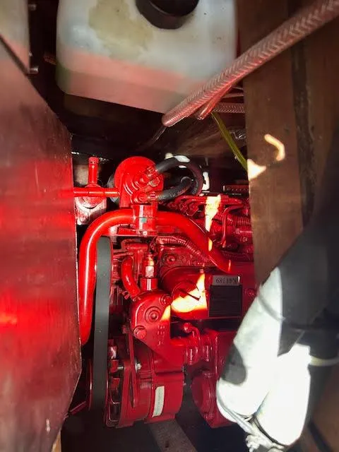 Slide: The Image of 1988 Sabre 38 engine compartment with red engine components. - 40