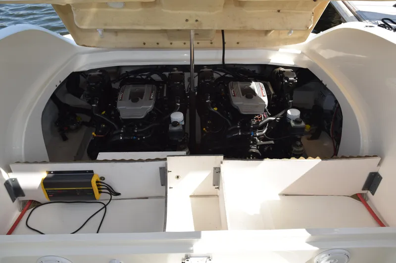 Slide: The Image of Engine compartment of a 2009 Sea Ray 300 SLX boat, showcasing dual engines. - 31