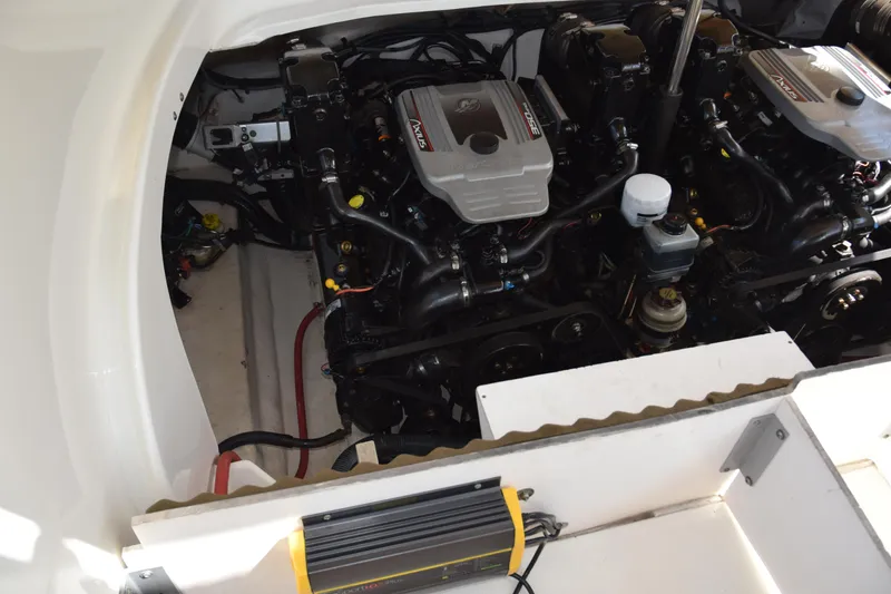 Slide: The Image of Engine compartment of a 2009 Sea Ray 300 SLX boat, showcasing dual engines. - 32