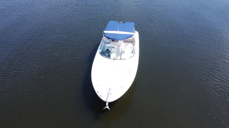 Slide: The Image of 2009 Sea Ray 300 SLX boat on calm water, aerial view. - 5