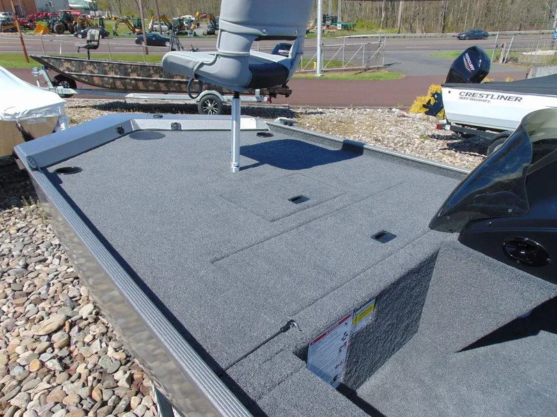 Slide: The Image of 2024 Crestliner 1600 Storm fishing boat with spacious deck and seating. - 6