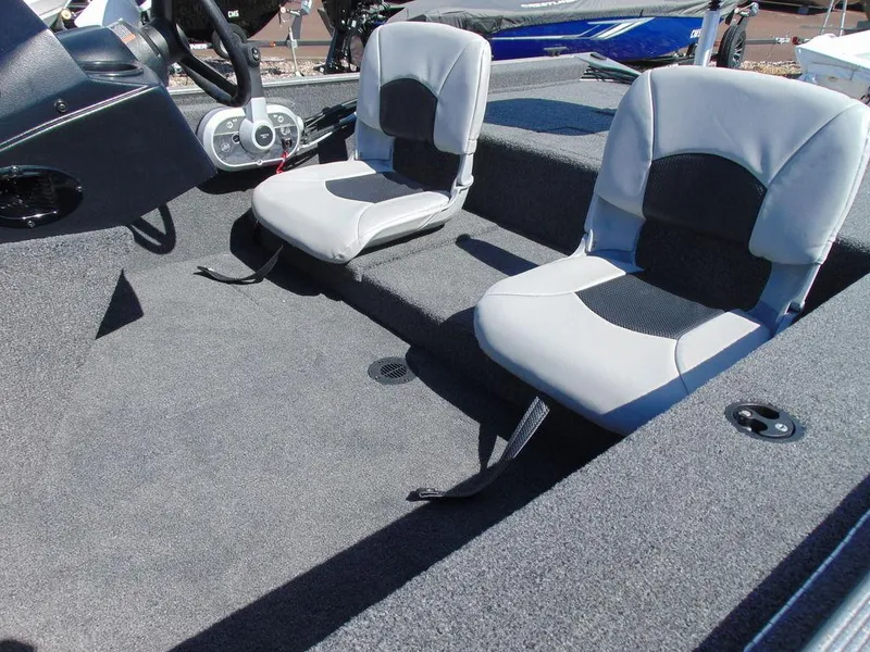 Slide: The Image of 2024 Crestliner 1600 Storm boat interior with two grey seats. - 8