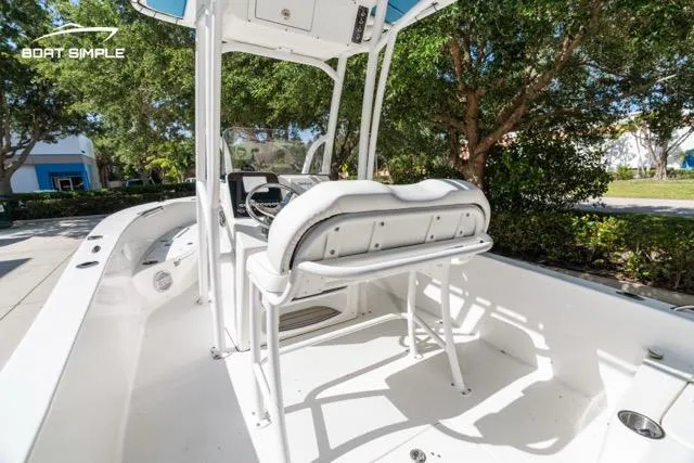 Slide: The Image of 2023 Sea Pro 199 Deep V Center Console boat interior with seating and console. - 9