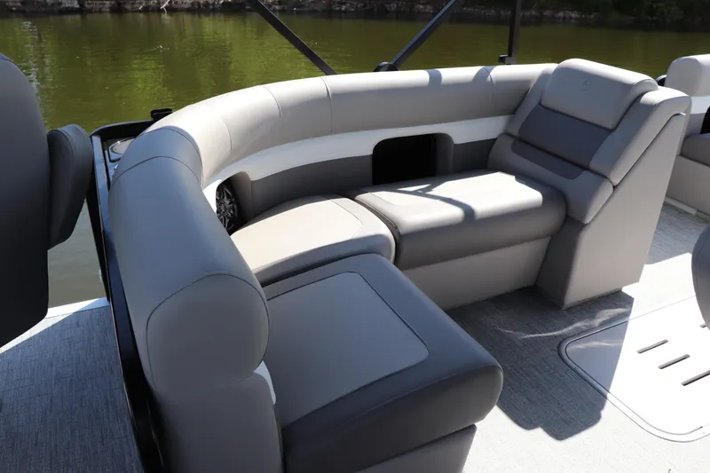 Slide: The Image of 2024 Premier 230 SunSation Angler boat interior with plush seating and elegant design. - 22