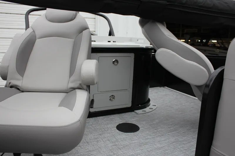Slide: The Image of 2024 Premier 230 SunSation Angler boat interior with comfortable seating and storage. - 37