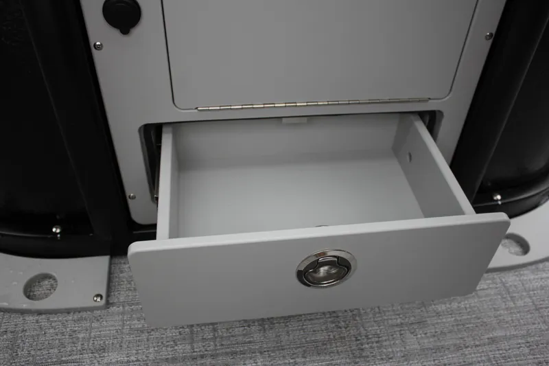 Slide: The Image of Open storage drawer on 2024 Premier 230 SunSation Angler boat. - 39