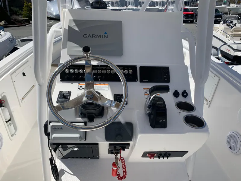 Slide: The Image of 2017 Edgewater 245 CC boat console with Garmin navigation system. - 10