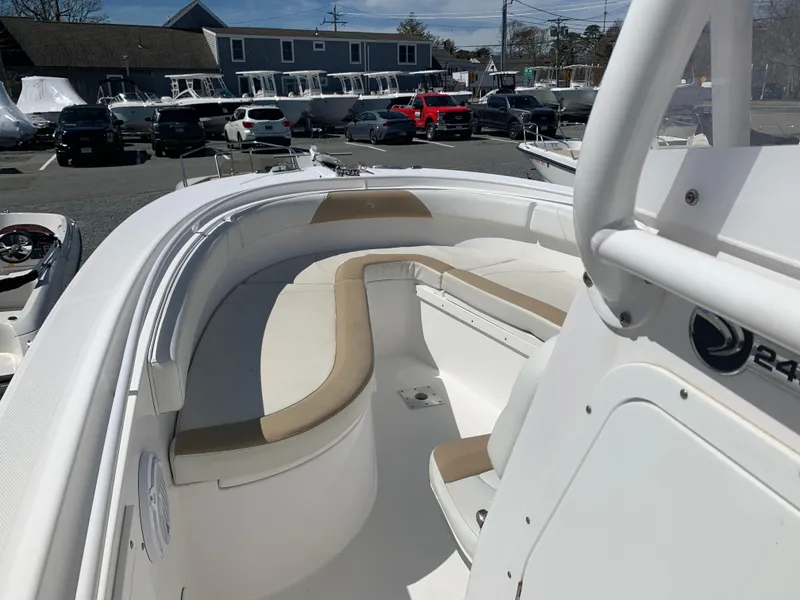 Slide: The Image of 2017 Edgewater 245 CC boat with spacious seating and modern design. - 7