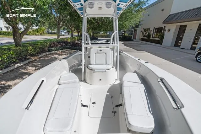 Slide: The Image of 2023 Sea Pro 199 Deep V Center Console boat with spacious seating and modern design. - 11