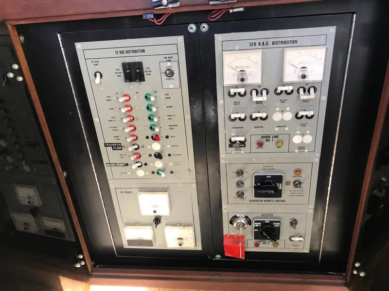 Slide: The Image of Electrical control panel of a 1981 Bertram 35 Convertible boat. - 13