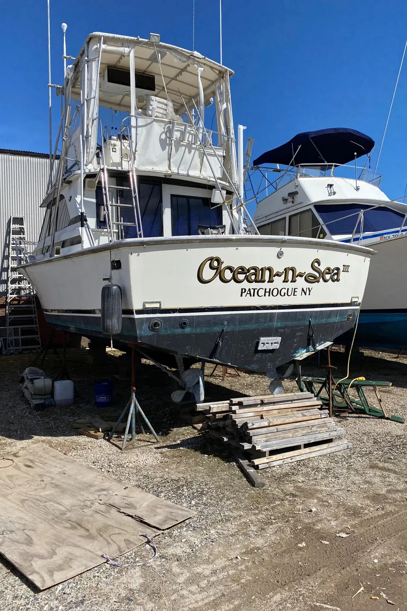 Slide: The Image of 1981 Bertram 35 Convertible boat named Ocean-n-Sea in Patchogue, NY, docked on land. - 22