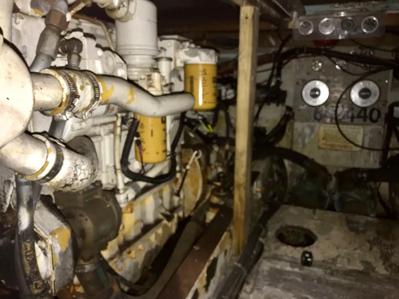 Slide: The Image of Engine room of a 1981 Bertram 35 Convertible boat. - 3