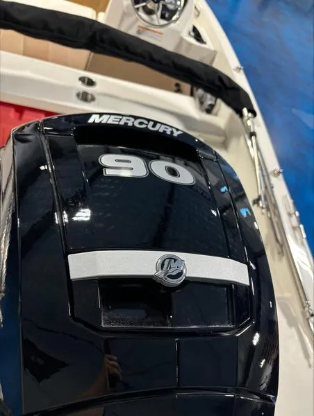 Slide: The Image of 2025 Boston Whaler 160 Super Sport with Mercury 90 engine, interior view. - 2