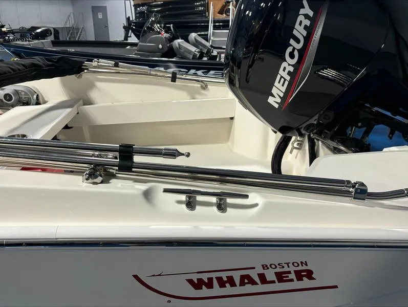 Slide: The Image of 2025 Boston Whaler 160 Super Sport with Mercury engine, interior view. - 6