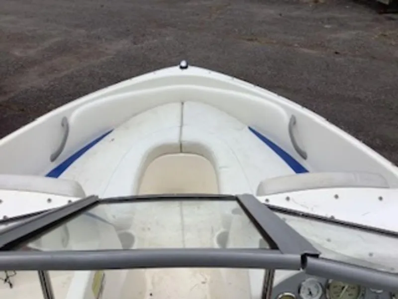 Slide: The Image of 2006 Bayliner 175 BR boat bow view with windshield and seating. - 2