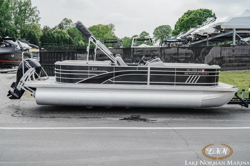 Slide: The Image of 2023 Bennington 23LSR pontoon boat at Lake Norman Marina. - 1