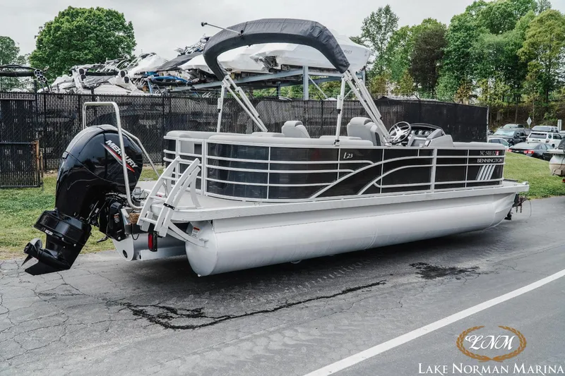 Slide: The Image of 2023 Bennington 23LSR pontoon boat at Lake Norman Marina. - 2