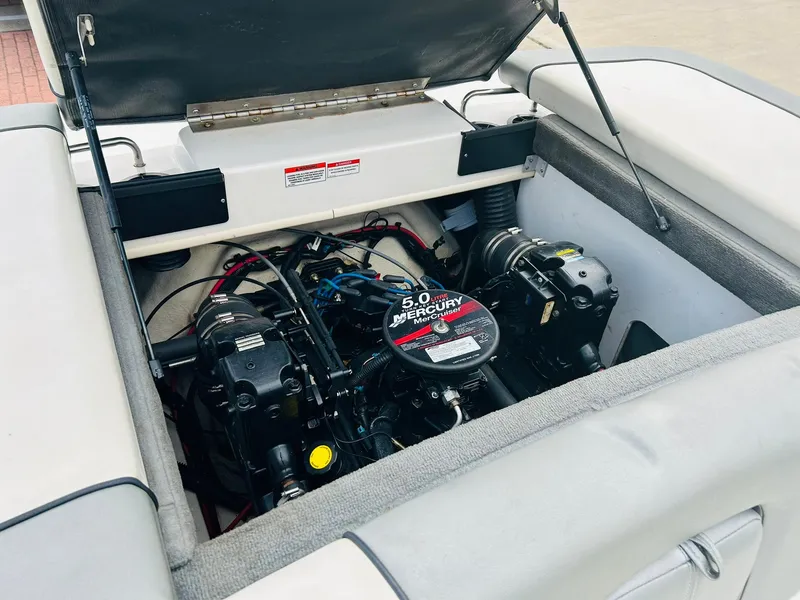 Slide: The Image of Engine compartment of a 2008 Sea Ray 205 Sport boat with a 5.0L Mercury engine. - 8